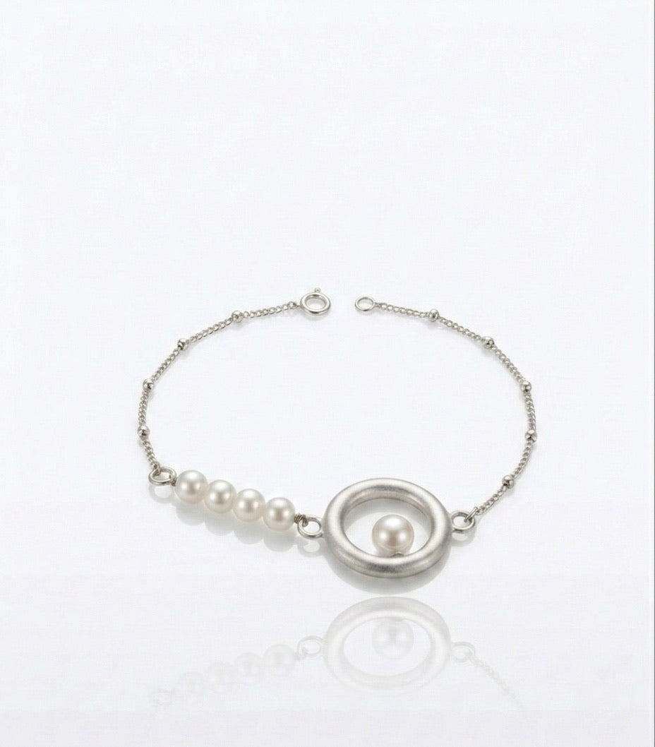 PULSERA FINE AURA
